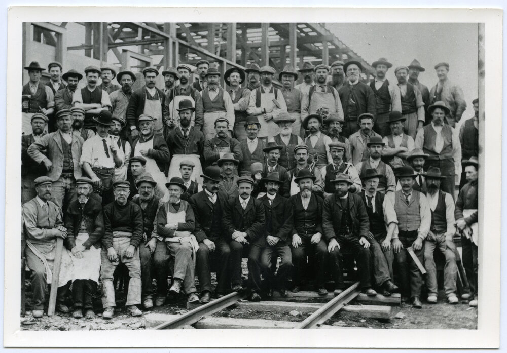 Tradesmen building Dunedin Railway Station