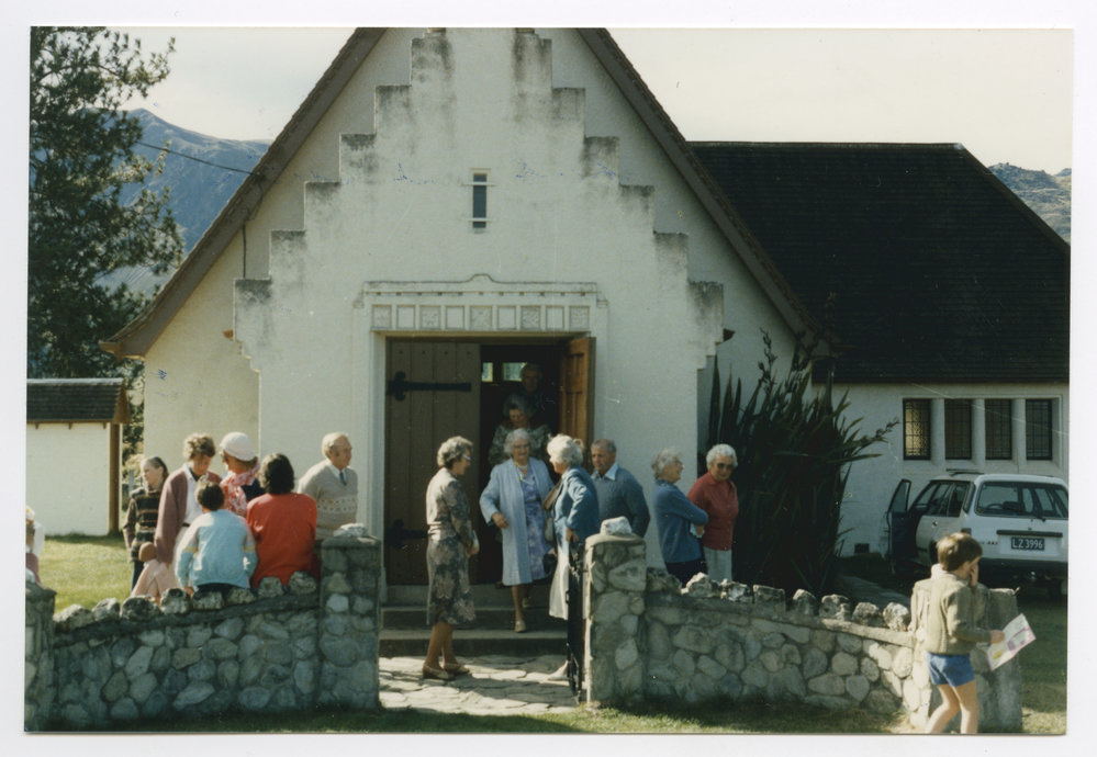 Hawea congregation leaving the church