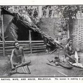 A Ni-Vanuatu man and his wife in front of their house, Malekula