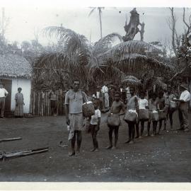 Returning from the plantation with baskets of raw cotton