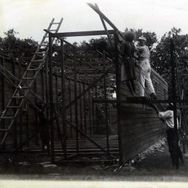Rev. Watt erecting barracks at Port Resolution
