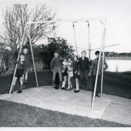 Children on the swings, Glendining Home, 1969