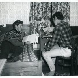 Two unknown boys studying at a Glendining Home Cottage, 1969