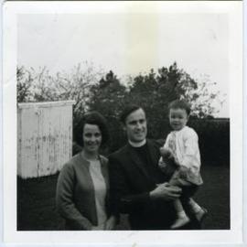 Reverend Simon H. Rae, Mrs. Marion B. Rae holding their child, c. 1971