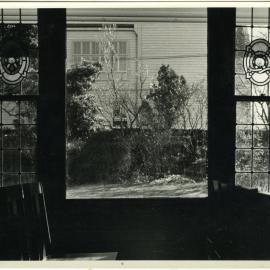 Looking through a window at the Deaconesses College