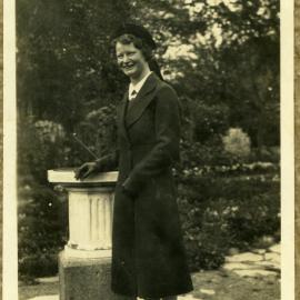 Miss Cathie G. Weir in a garden 