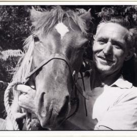 Unknown man and horse