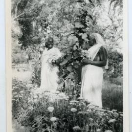 Two unidentified Indian women in the garden