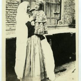 "Showers - Lahou," Unidentified Indian women and her child