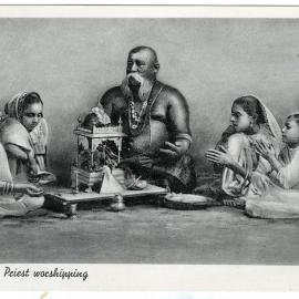 A Hindu priest worshipping