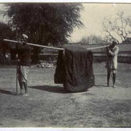 Purdah children being carried to school