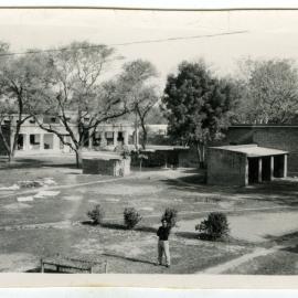 "A). A view of the Hospital compound." 