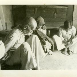At Prayer.