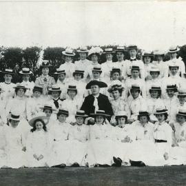 Dr. Gibb & First Church Young Women.