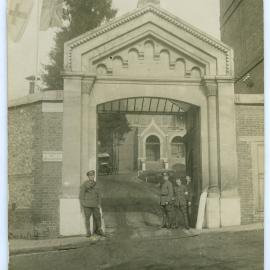 Soldier outside a gate 
