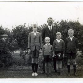 Unidentified man and his four sons