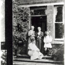 Family portrait taken on the doorstep, 1912