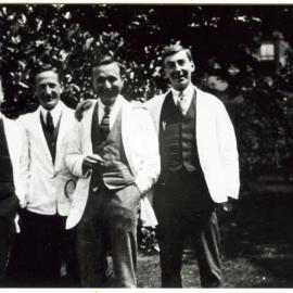 Charles Burns, Arnold Perry and two unidentified men