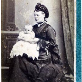 Mary Moore (nee Stewart) holding a baby, portrait