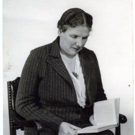 Unidentified woman reading 
