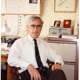 Reverend Doctor Simon H. Rae in his office 