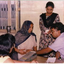 A geriatric patient from Pauni Village receives medical care