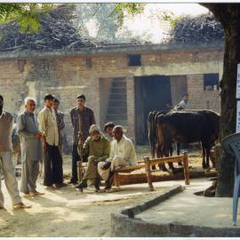 Community health workers gather outside their base in their village
