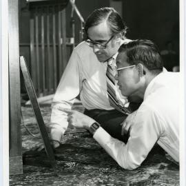Reverend Simon Rae and Ping Nah Ng, studying
