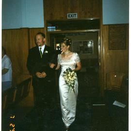 Helen Morton is walked down the aisle with brother Grahame Morton, to marry Tam Willacy, St. Enoch's Church