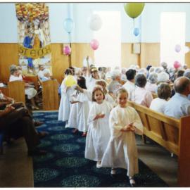Mellissa Campbell leads the 'angels,' out of St. Enoch's Church, 1990