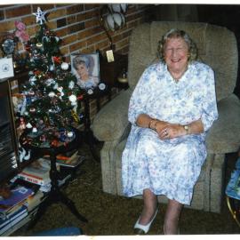 Ngaire Barton, listening to Christmas carols by Sunday School children, 1997