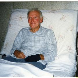 Alec Williamson, listening to Christmas carols by Sunday School children, 1997 