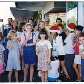 Sunday School Christmas carolers enjoying an ice-cream, 1997