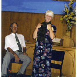 Jill Whimp shows off farewell gifts with Reverend Neal Whimp, 2000