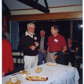 Kevin Patmore speaking to Ron Maunder, Harry bush in background, St. Enoch's Church