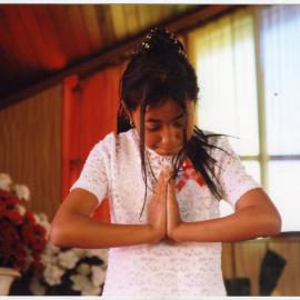 A young girl prays, White Sunday, Glen Eden Pacific Islanders Church, 2002