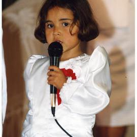 A young girl singing at Glen Eden Pacific Islanders Church during a White Sunday service, 2002