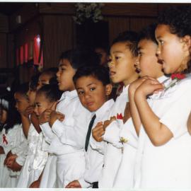Children sing and dance at the White Sunday service at Glen Eden Pacific Islanders Church, 2002