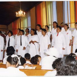 Group of young men and women singing at the White Sunday service at Glen Eden Pacific Islanders Church, 2002
