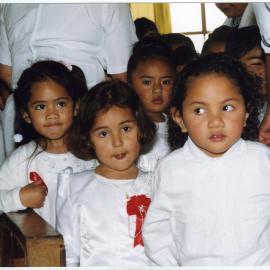 Close-up portrait of young children at the Glen Eden Pacific Islanders Church, White Sunday service, 2002