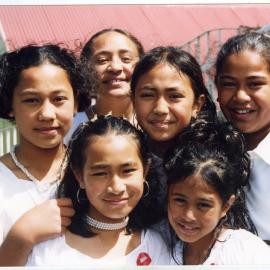 Close-up portrait of young children at the Glen Eden Pacific Islanders Church, White Sunday service, 2002
