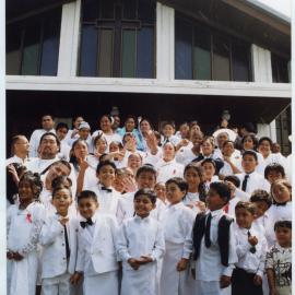 Group portrait of children who attended the White Sunday service at Glen Eden Pacific Islanders Church, 2002