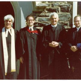 Four Cromwell ministers stand outside St. John's Church, Cromwell