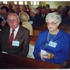 Bob Cotter and Betty Cotter seated in a pew, St .Columba, Christchurch, 2000
