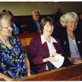Margaret Ufton, Gloria Fiebig and Anne Delaney seated in a pew, St. Columba, Christchurch