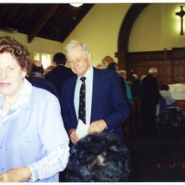 Dorothy King and Rob McMecking walking down the aisle in single file, St. Columba, Christchurch