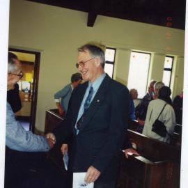 Ian Lloyd, shaking hands with unidentified male, St. Columba, Christchurch