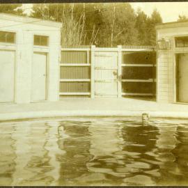 "Hanmer Pools," two unidentified men relaxing in pools