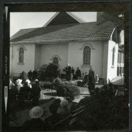 Unidentified man stands giving a speech, John Knox, Rangiora, 1972