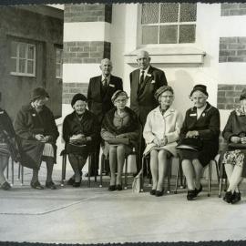 Seven unidentified women and two unidentified men during John Knox Church's centenary celebrations, 1972